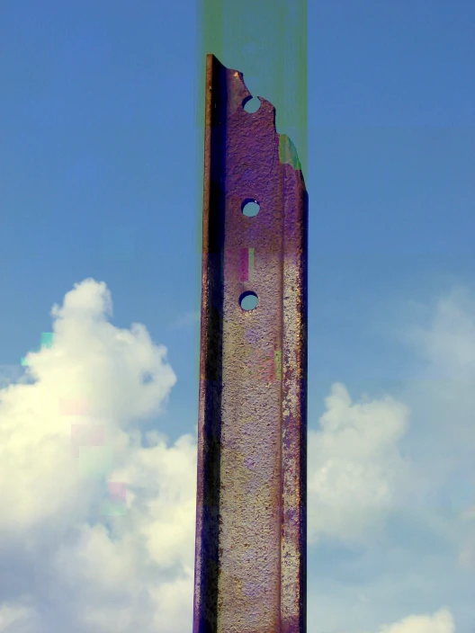 iron beam against clouds